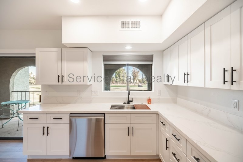 Stunning Remodel with Water and Golf Course Views! property image