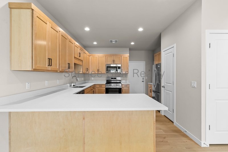 Modern 3-Bedroom Townhome with Loft & Community Pool ? 2 Car Garage! property image