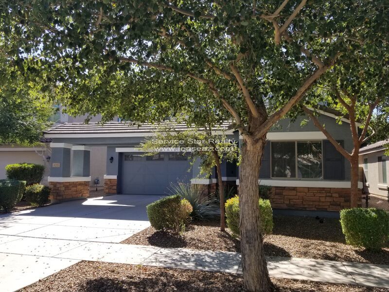 GORGEOUS POWER RANCH 4 BEDROOM WITH GRASS NEXT TO COMMUNITY PARK property image