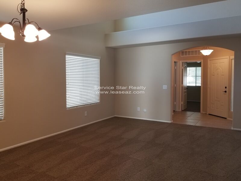 GORGEOUS POWER RANCH 4 BEDROOM WITH GRASS NEXT TO COMMUNITY PARK property image