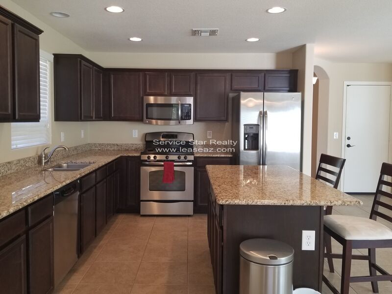 GORGEOUS POWER RANCH 4 BEDROOM WITH GRASS NEXT TO COMMUNITY PARK property image