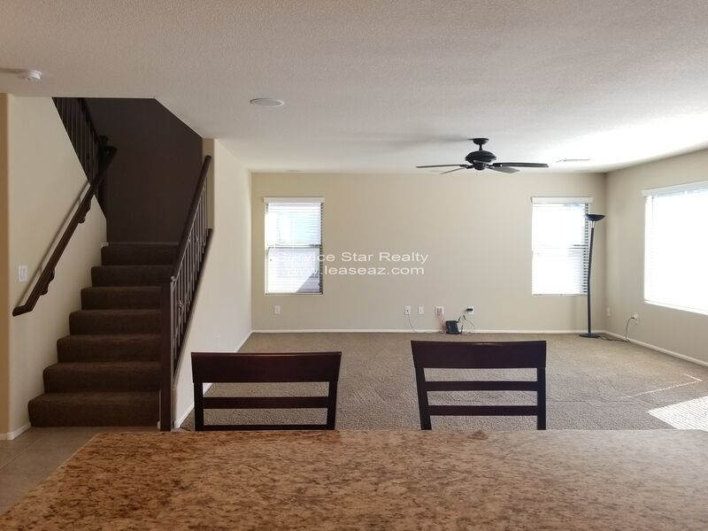 GORGEOUS POWER RANCH 4 BEDROOM WITH GRASS NEXT TO COMMUNITY PARK property image