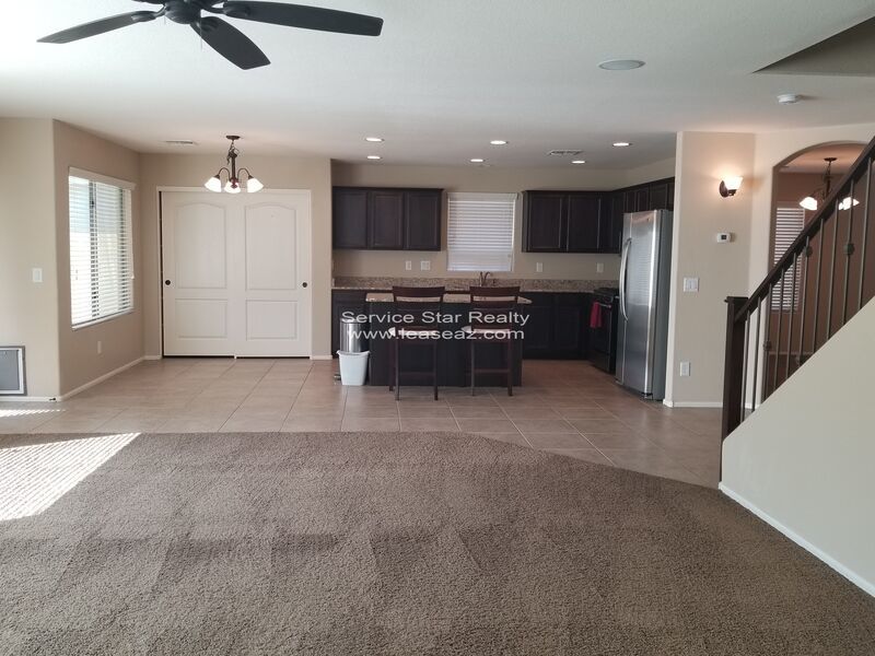 GORGEOUS POWER RANCH 4 BEDROOM WITH GRASS NEXT TO COMMUNITY PARK property image