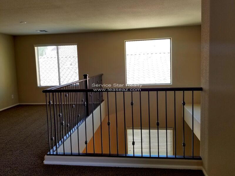 GORGEOUS POWER RANCH 4 BEDROOM WITH GRASS NEXT TO COMMUNITY PARK property image