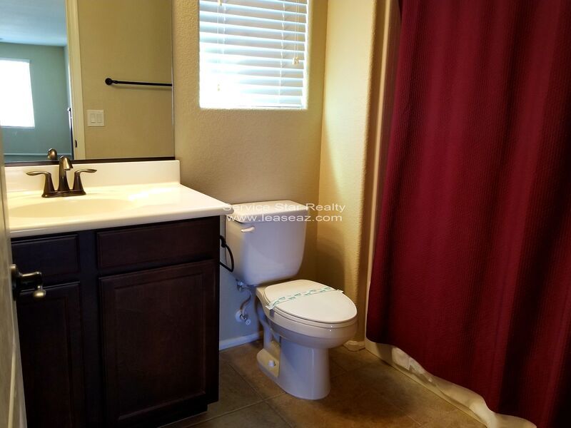 GORGEOUS POWER RANCH 4 BEDROOM WITH GRASS NEXT TO COMMUNITY PARK property image