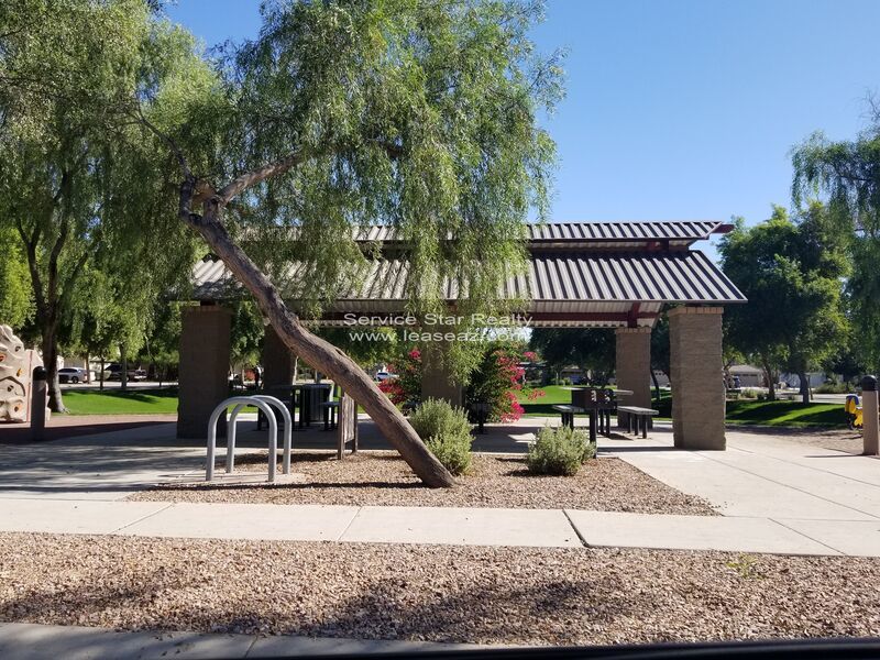 GORGEOUS POWER RANCH 4 BEDROOM WITH GRASS NEXT TO COMMUNITY PARK property image