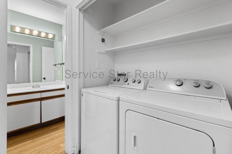 Clean & Move-In Ready | 2 Bed + Den Townhome Near Shopping & Dining property image